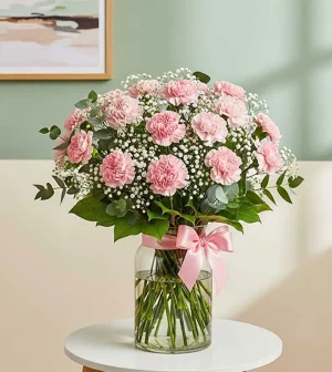 Claveles rosados frescos en arreglo floral elegante para pesame y condolencias a domicilio en la Ciudad de México