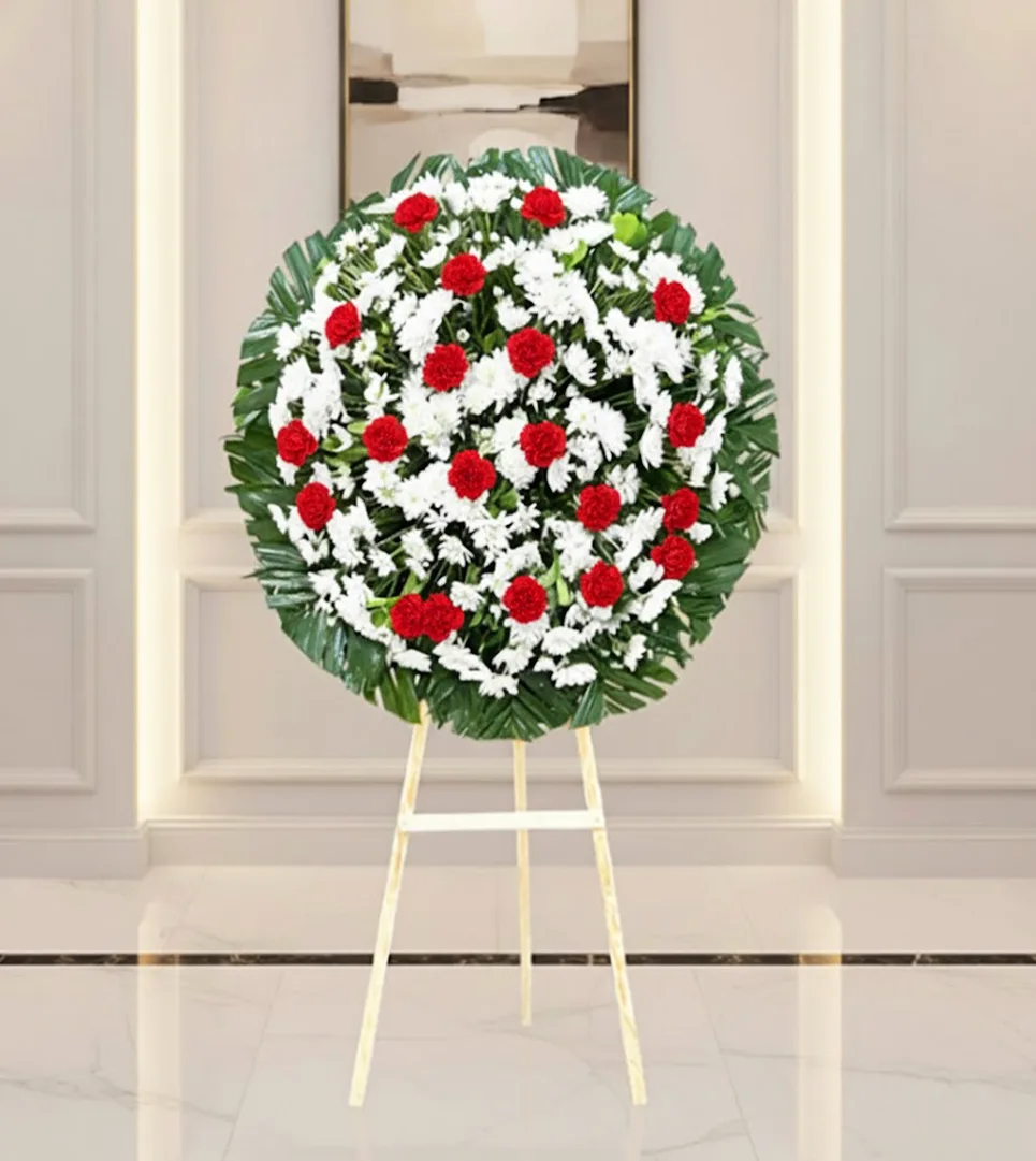 Corona de flores para difuntos en diseño elegante con entrega a domicilio en CDMX.